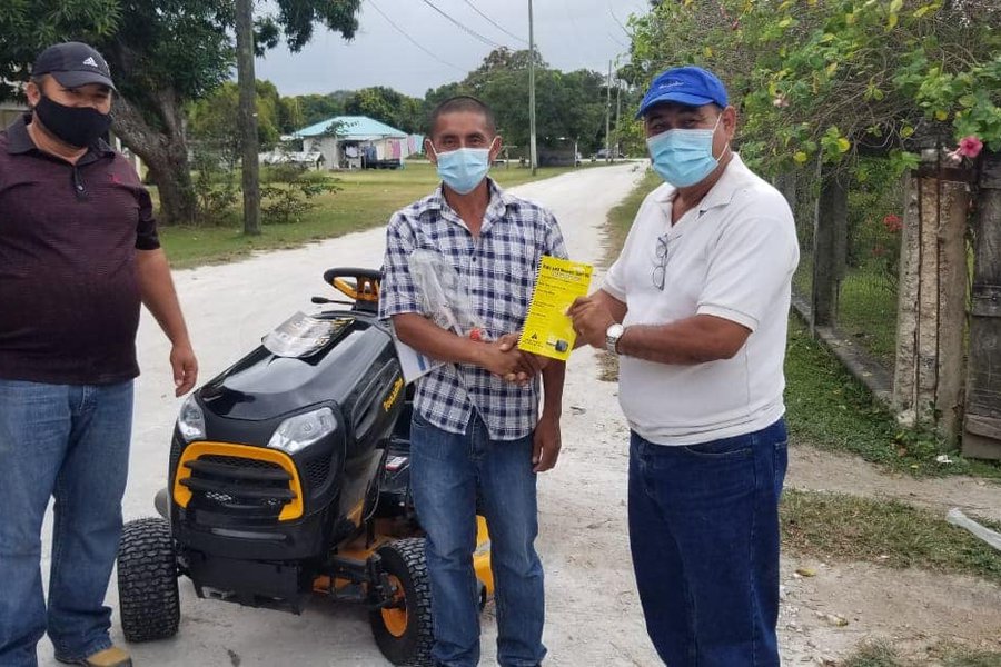 HANDING OVER RIDING MOWER SAN NARCISO MINISTER RAMIREZ